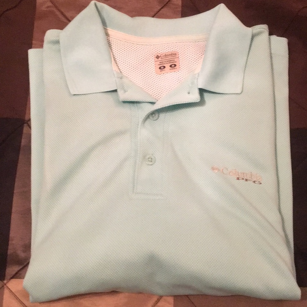 Aqua colored performance fishing polo shirt